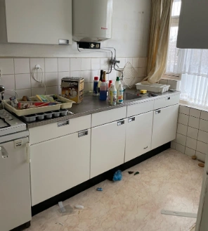 ontruiming-de-zwart-flat-mariahoeve-gallery-3 keuken ontruimen vol met troep