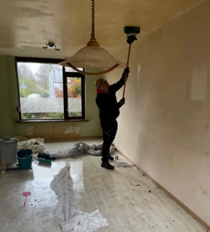 woningontruiming in malde muur verven