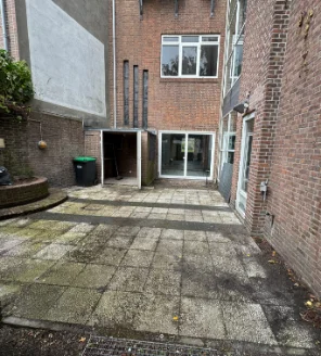 Schoon terras na professionele reiniging en ontruiming tuin